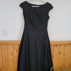 NWOT,  black Cocktail, Fit and Flare, to the knee, size M.